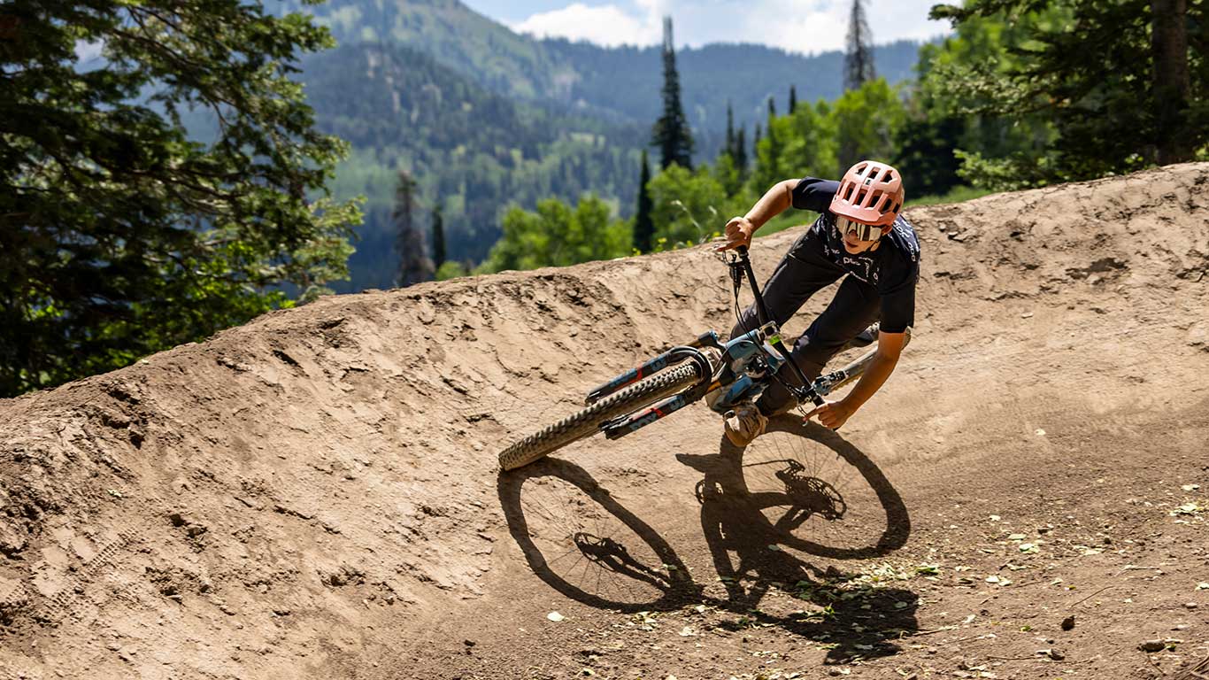 White Pine Touring guide riding on a mountain bike trail near Park City, UT.