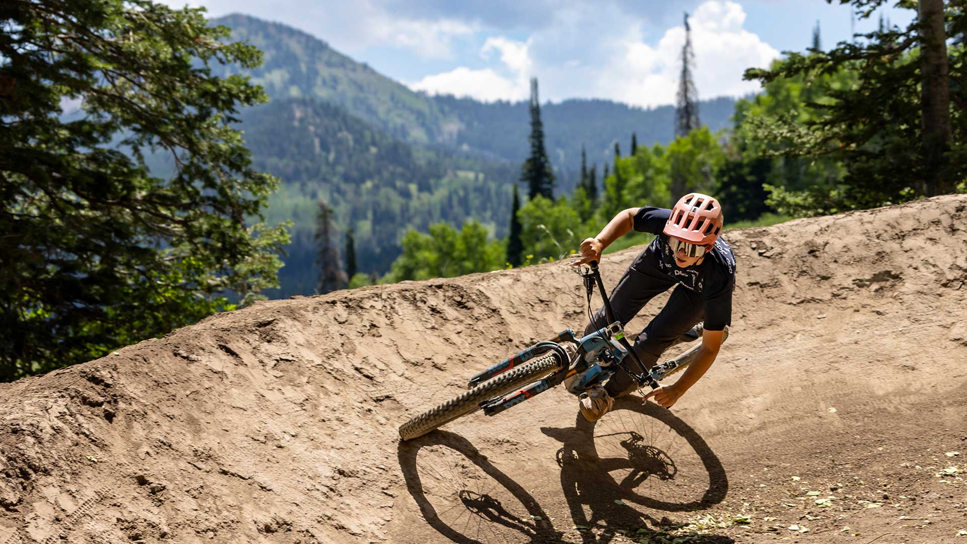 White Pine Touring guide leading a mountain biking cornering clinic in Park City, UT.
