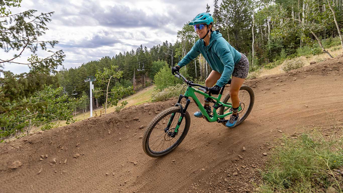 White Pine Touring guide riding on a mountain bike trail near Park City, UT
